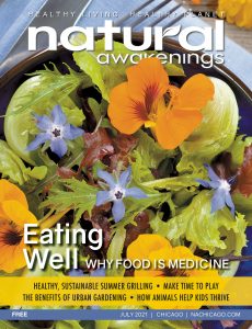 July 2021 Natural Awakenings Magazine of Chicago cover with a bowl of salad with edible flowers