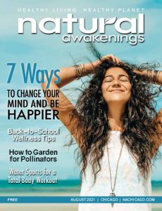 August 2021 Cover of Natural Awakenings Chicago Magazine with a woman on the beach with arms open to possibilities