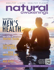June 2022 Cover Natural Awakenings Chicago Magazine with a guy and his dog sitting on teh beach at sunset.